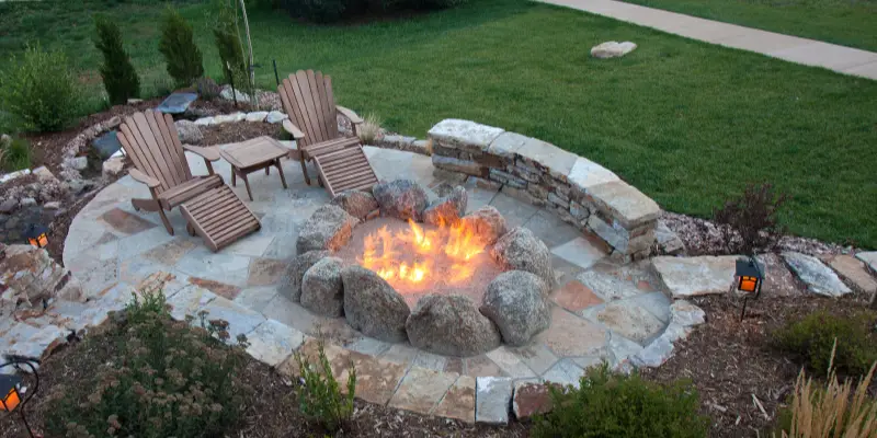 gas firepit adds to landscaping 